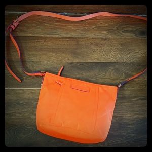 Vera Bradley orange crossbody purse .